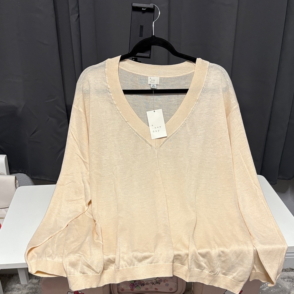 Cream V-Neck Sweater